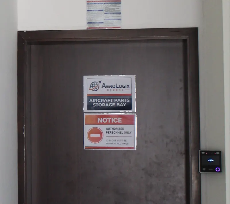Security camera and card-reader access control at a restricted door